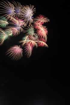 Japanese traditional fireworks in the night sky 