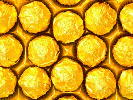 close up of candy in gold wrappers
