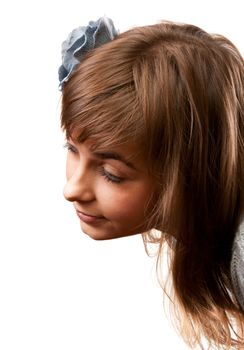 Portrait of the young girl in flower in hair on white background