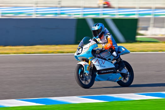 JEREZ DE LA FRONTERA, SPAIN - APR 16: 125cc motorcyclist Shankar Sarath Kumar races in the CEV Championship race on April 16, 2011 in Jerez de la Frontera, Spain.
