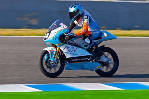 JEREZ DE LA FRONTERA, SPAIN - APR 16: 125cc motorcyclist Shankar Sarath Kumar races in the CEV Championship race on April 16, 2011 in Jerez de la Frontera, Spain.
