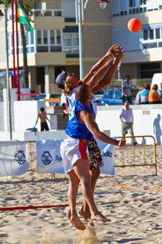 CADIZ, SPAIN - JULY 19: Unidentified players compete in a match between Valcarcel Recuperado and DecoHogar in the 19th league of beach handball of Cadiz on July 19, 2011 in Cadiz, Spain