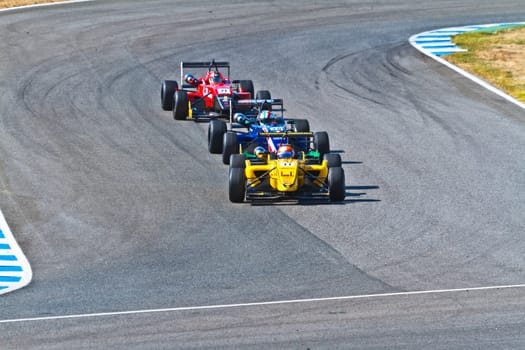 JEREZ DE LA FRONTERA, SPAIN - OCT 16: Matteo Torta (11) followed by Luca Orlandi (28) and Manuel Bajarano (21)races on European F3 championship on October 16 , 2011, in Jerez de la Frontera , Spain