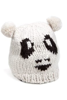 Warm hat patterned with a person on a white background