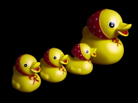 Yellow rubber mother duck toy and child isolated