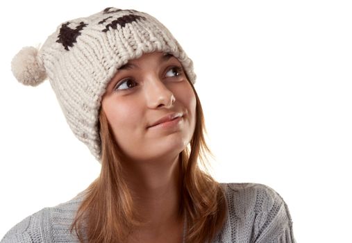 Portrait of the young girl in hat on white background