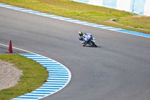 JEREZ DE LA FRONTERA, SPAIN - MAR 5:125cc pilot Sergio Gadea races on the official training of the world championship of MotoGP on Mar 5, 2011, in racetrack of velocity of Jerez de la Frontera, Spain