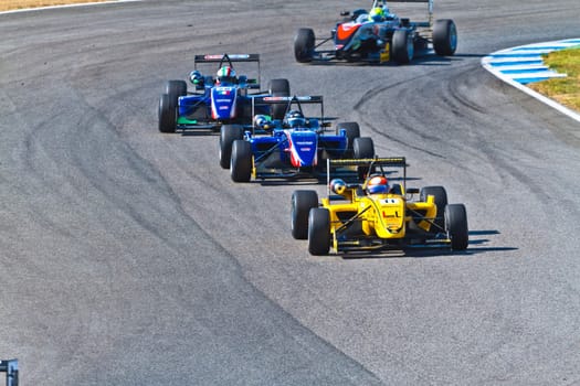 JEREZ DE LA FRONTERA, SPAIN - OCT 16: Matteo Torta(11) followed by Tatiana Calderon (4) and Luca Orlandi(28) races on European F3 championship on October 16 , 2011, in Jerez de la Frontera , Spain