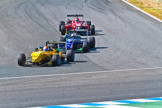JEREZ DE LA FRONTERA, SPAIN - OCT 16: Matteo Torta (11) followed by Luca Orlandi (28) and Manuel Bajarano (21)races on European F3 championship on October 16 , 2011, in Jerez de la Frontera , Spain
