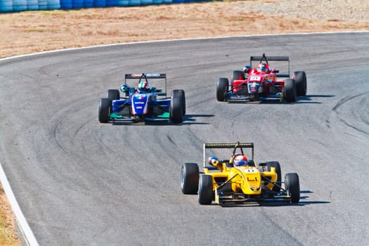 JEREZ DE LA FRONTERA, SPAIN - OCT 16: Matteo Torta (11) followed by Luca Orlandi (28) and Manuel Bajarano (21)races on European F3 championship on October 16 , 2011, in Jerez de la Frontera , Spain