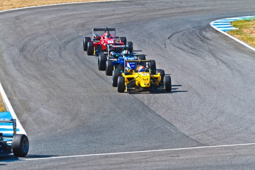 JEREZ DE LA FRONTERA, SPAIN - OCT 16: Matteo Torta (11) followed by Luca Orlandi (28) and Manuel Bajarano (21)races on European F3 championship on October 16 , 2011, in Jerez de la Frontera , Spain