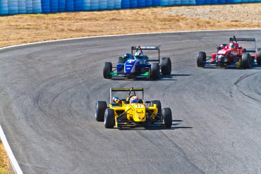 JEREZ DE LA FRONTERA, SPAIN - OCT 16: Matteo Torta (11) followed by Luca Orlandi (28) and Manuel Bajarano (21)races on European F3 championship on October 16 , 2011, in Jerez de la Frontera , Spain