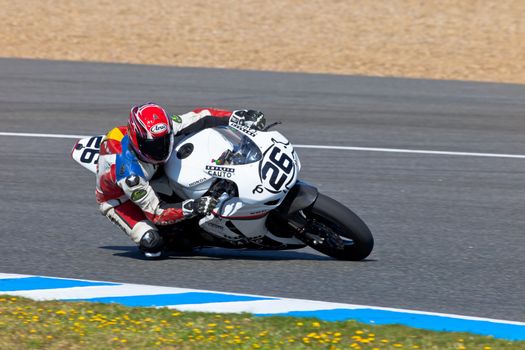 JEREZ DE LA FRONTERA, SPAIN - APR 16: Stock Extreme motorcyclist Adrian Gandara Gutierrez takes a curve in the CEV Championship race on April 16, 2011 in Jerez de la Frontera, Spain