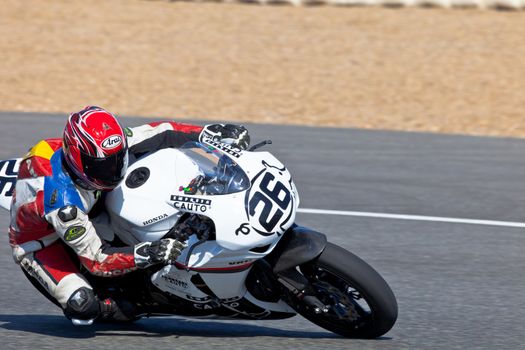 JEREZ DE LA FRONTERA, SPAIN - APR 16: Stock Extreme motorcyclist Adrian Gandara Gutierrez takes a curve in the CEV Championship race on April 16, 2011 in Jerez de la Frontera, Spain