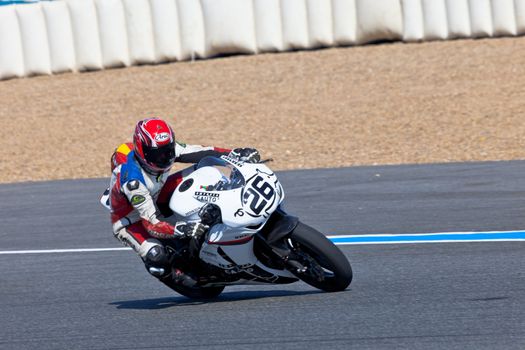 JEREZ DE LA FRONTERA, SPAIN - APR 16: Stock Extreme motorcyclist Adrian Gandara Gutierrez takes a curve in the CEV Championship race on April 16, 2011 in Jerez de la Frontera, Spain