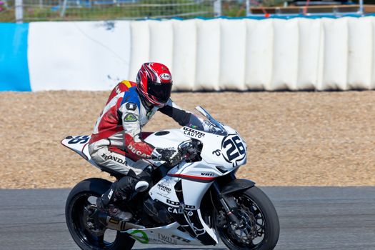 JEREZ DE LA FRONTERA, SPAIN - APR 16: Stock Extreme motorcyclist Adrian Gandara Gutierrez takes a curve in the CEV Championship race on April 16, 2011 in Jerez de la Frontera, Spain