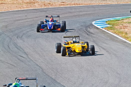 JEREZ DE LA FRONTERA, SPAIN - OCT 16: Alex Fontana (11) followed by Sam Dejonghe (58)  races on European F3 championship on October 16 , 2011, in Jerez de la Frontera , Spain