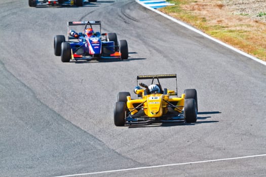 JEREZ DE LA FRONTERA, SPAIN - OCT 16: Alex Fontana (11) followed by Sam Dejonghe (58)  races on European F3 championship on October 16 , 2011, in Jerez de la Frontera , Spain