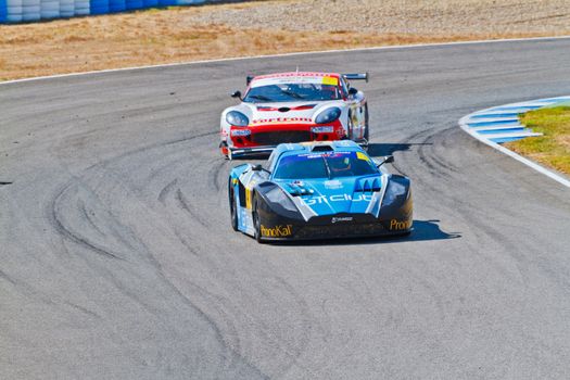 JEREZ DE LA FRONTERA, SPAIN - OCT 16: Ferran Monje(4) followed by Francesc Gutierrez(42)races on Iber GT championship on October 16 , 2011, in Jerez de la Frontera , Spain