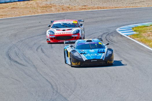 JEREZ DE LA FRONTERA, SPAIN - OCT 16: Ferran Monje(4) followed by Francesc Gutierrez(42)races on Iber GT championship on October 16 , 2011, in Jerez de la Frontera , Spain