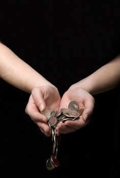 Coins flowing out of hands