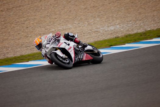 JEREZ DE LA FRONTERA, SPAIN - NOV 20: Stock Extreme motorcyclist Javier Fores takes a curve in the CEV championship on Nov 20, 2010, in Jerez de la Frontera, Spain