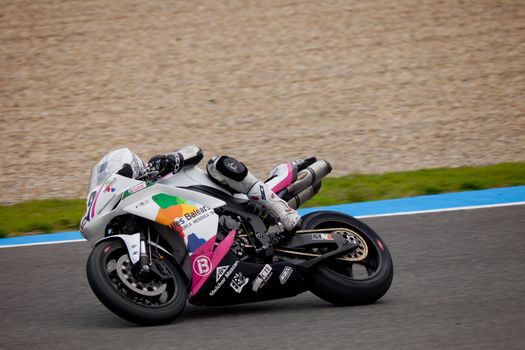 JEREZ DE LA FRONTERA, SPAIN - NOV 20: Stock Extreme motorcyclist Alfonso Ho takes a curve in the CEV championship on Nov 20, 2010, in Jerez de la Frontera, Spain