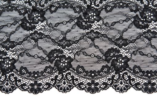 Black lace with pattern with form flower on white background