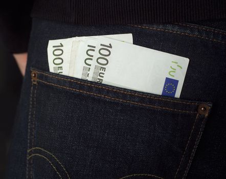 100 Euro Bank notes in a jeans pocket