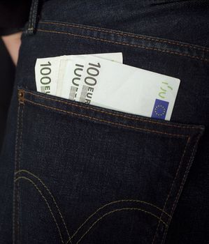 100 Euro Bank notes in a jeans pocket