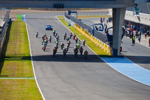 JEREZ DE LA FRONTERA, SPAIN - APR 17: Motorbike competitors begin the Moto2 race in the CEV Championship on April 17, 2011 in Jerez de la Frontera, Spain.