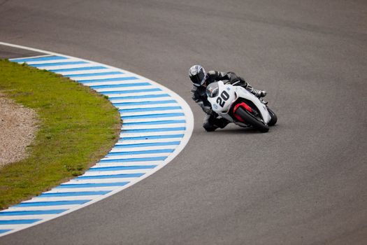 JEREZ DE LA FRONTERA, SPAIN - NOV 20: Stock Extreme motorcyclist Juan Alonso takes a curve in the CEV championship on Nov 20, 2010, in Jerez de la Frontera, Spain