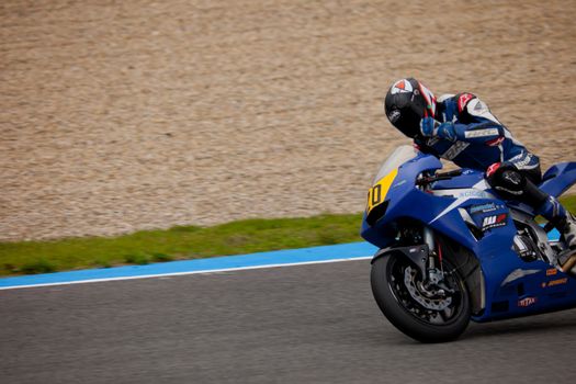 JEREZ DE LA FRONTERA, SPAIN - NOV 20: Moto2 motorcyclist Mathew Scholtz  takes a curve in the CEV Championship on Nov 20, 2010, in Jerez de la Frontera, Spain