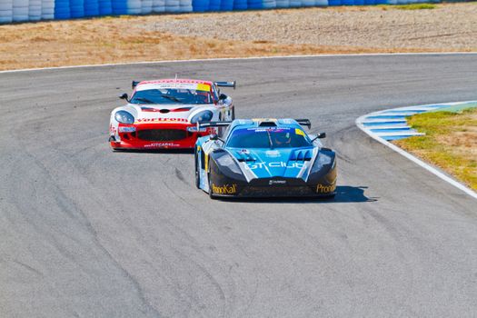 JEREZ DE LA FRONTERA, SPAIN - OCT 16: Ferran Monje(4) followed by Francesc Gutierrez(42)races on Iber GT championship on October 16 , 2011, in Jerez de la Frontera , Spain