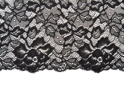 Decorative white lace on insulated black background