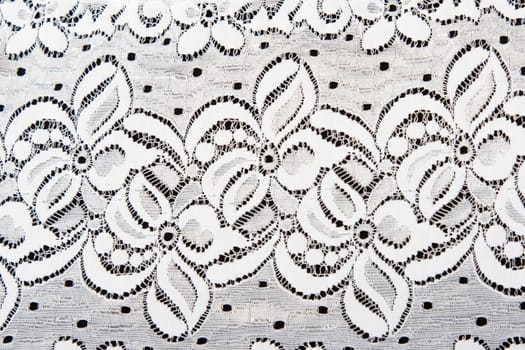 White lace with pattern in the manner of flower by background