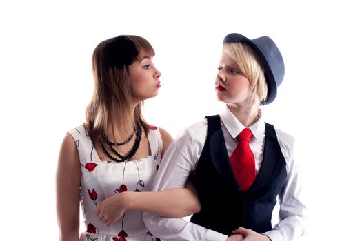 Two girls will wipe friend on friend, girl with drawn moustache in hat