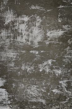 Aged painted cement wall background. With strokes of white paint