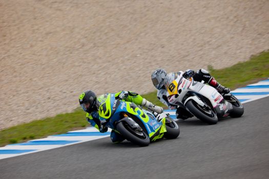 JEREZ DE LA FRONTERA, SPAIN - NOV 20: MOTO2 motorcyclist Jordi Torres and Daniel Arcas takes a curve in the CEV championship on Nov 20, 2010, in Jerez de la Frontera, Spain