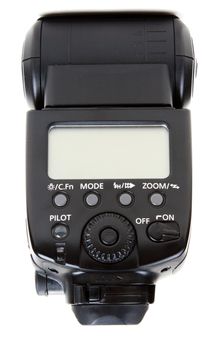 Photo flash in black plastic body on white background