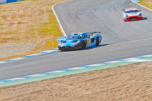 JEREZ DE LA FRONTERA, SPAIN - OCT 16: Ferran Monje(4) followed by Francesc Gutierrez(42)races on Iber GT championship on October 16 , 2011, in Jerez de la Frontera , Spain