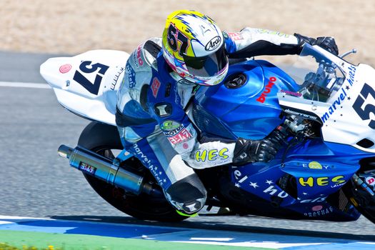 JEREZ DE LA FRONTERA, SPAIN - APR 17: Stock Extreme motorcyclist Ferran Casas takes a curve in the CEV Championship race on April 17, 2011 in Jerez de la Frontera, Spain