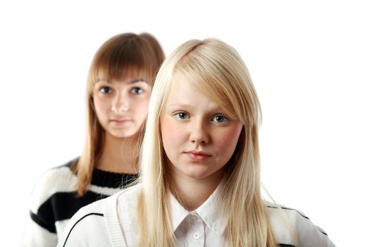 Portrait two girls small depth to sharpnesses on white background