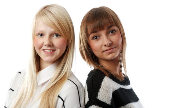 Portrait two girls of the blonde and brunettes insulated on white background