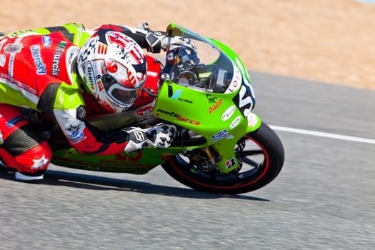 JEREZ DE LA FRONTERA, SPAIN - APR 17: 125cc motorcyclist Juanfran Guevara takes a curve in the CEV Championship race on April 17, 2011 in Jerez de la Frontera, Spain.