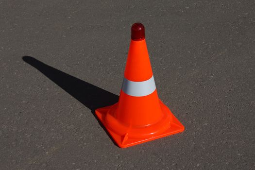 Safety warning sign - road traffic cone on street