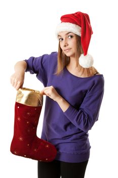 Beautiful girl in red Santa hat on a white background