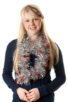 A beautiful young girl in the Christmas tinsel on a white background
