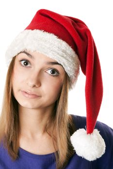 Beautiful girl in red Santa hat on a white background