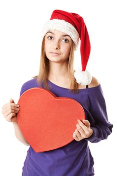 Beautiful girl in red Santa hat on a white background